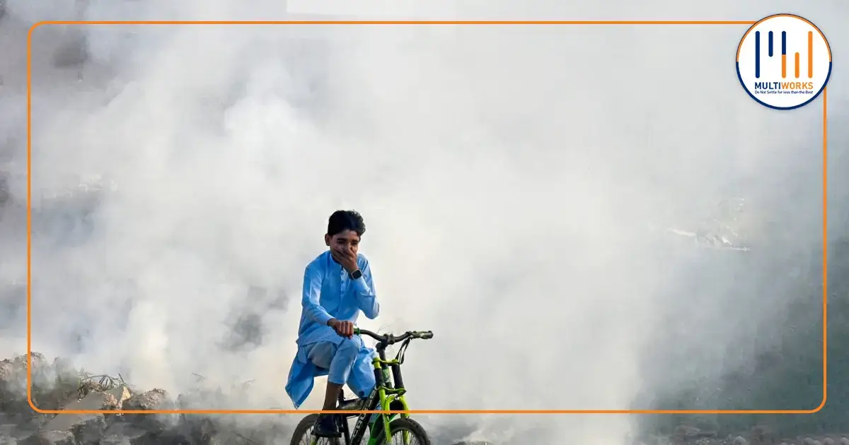 A boy riding a bicycle through heavy smog, representing air pollution challenges in Islamabad and the need for sustainable solutions.