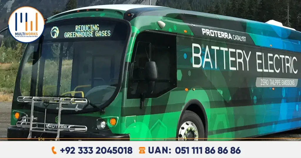 Battery-electric bus with a green design and 'Reducing Greenhouse Gases' display, part of Rawalpindi's eco-friendly public transport initiative.